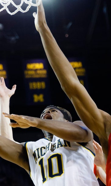 Walton posts triple-double, Michigan routs Youngstown State 105-46